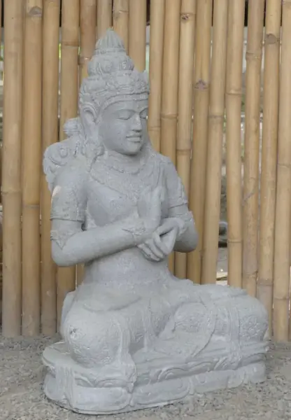 Product image 5 of the product “Seated Dewi Sri, position chakra turning the wheel, 79 cm high riverstone grey, modell with sativa ”